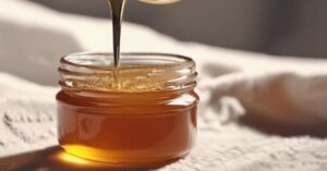 Jar of honey , symbolizing the Benefits of Honey During a Cold